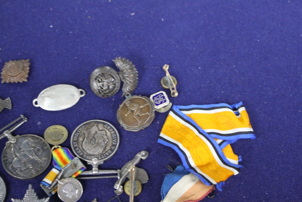 A WWI group of two medals to Second Lieut.G.P.Boyd, a similar group of two to 147522 Gnr.A.J.G.Marshall R.A. and sundry badges includin